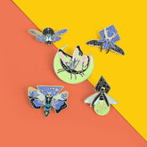 Pines luminosos de esmalte de dibujos animados